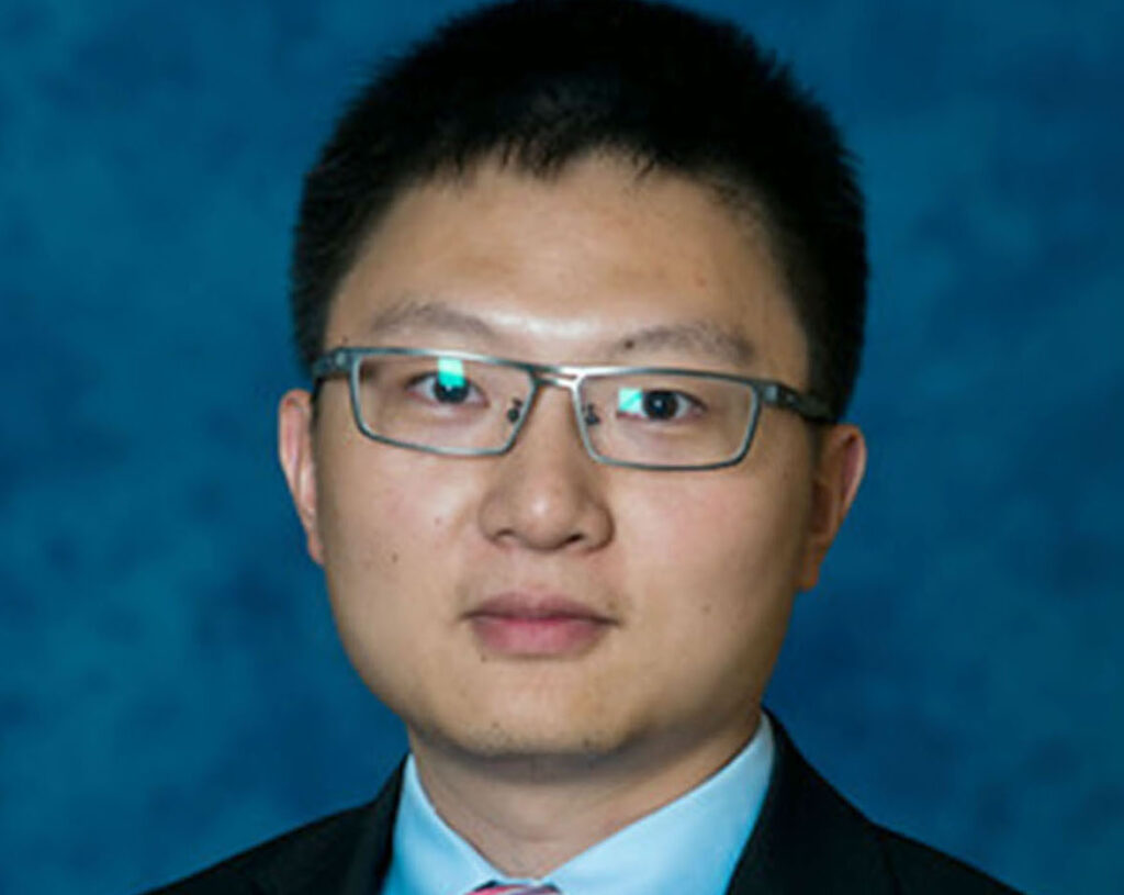 Professional photo of Tufts GBA faculty member Dr. Eddie Zhao